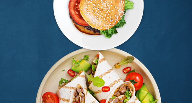 Burger and tacos on a placte forming an eight